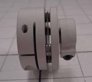 Disc Type Coupling, Type Single Flex, Hub # 1 Bore 8mm, Hub # 1 Outer Diameter 34mm, Hub # 2 Bore 14mm, Hub # 2  Outer Diameter 34mm, Overall Length 27.30mm, Clamping Style Clamp