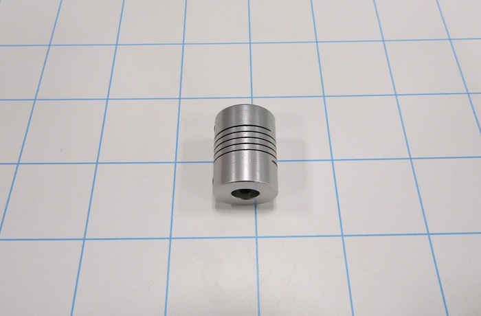 Flexible Cushion Type Coupling, Hub # 1 Bore 6mm, Hub # 1 Outer Diameter 18 mm, Hub # 2 Bore 8mm, Hub # 2  Outer Diameter 18 mm, Overall Length 25 mm, Clamping Style Set Screw