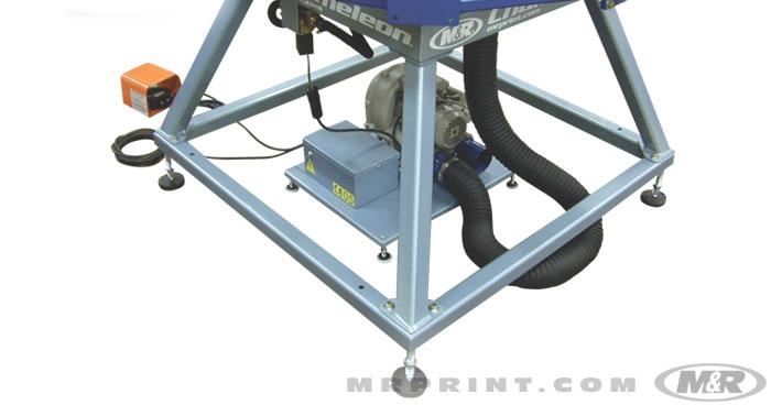 SureVac Vacuum Pallet System's foot pedal and valve assembly for the SureVac Vacuum Pallet System mounted on the Chameleon manual press